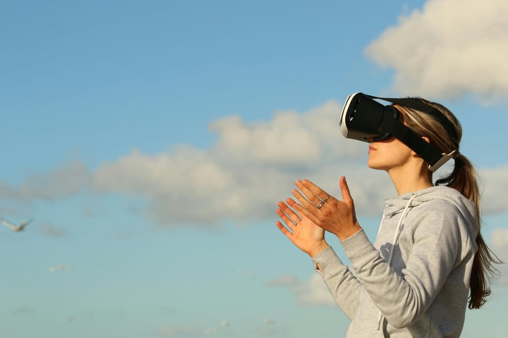 a woman wearing virtual reality goggles