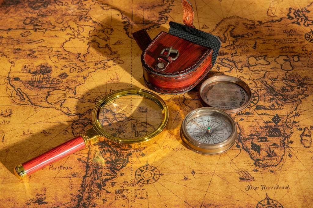magnifier and compass on an old map